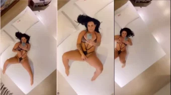 Melissa Pitanga tocándose en la cama del motel