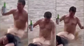 Amador registra la escena de la corona dando algunas cercas en un gordito lleno de baches y borracho durante un baño de río